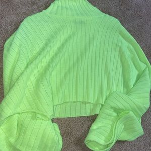 Neon green sweater. Long flowy sleeves